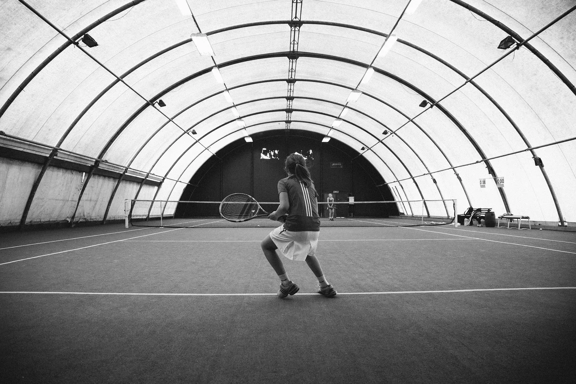 Person playing tennis